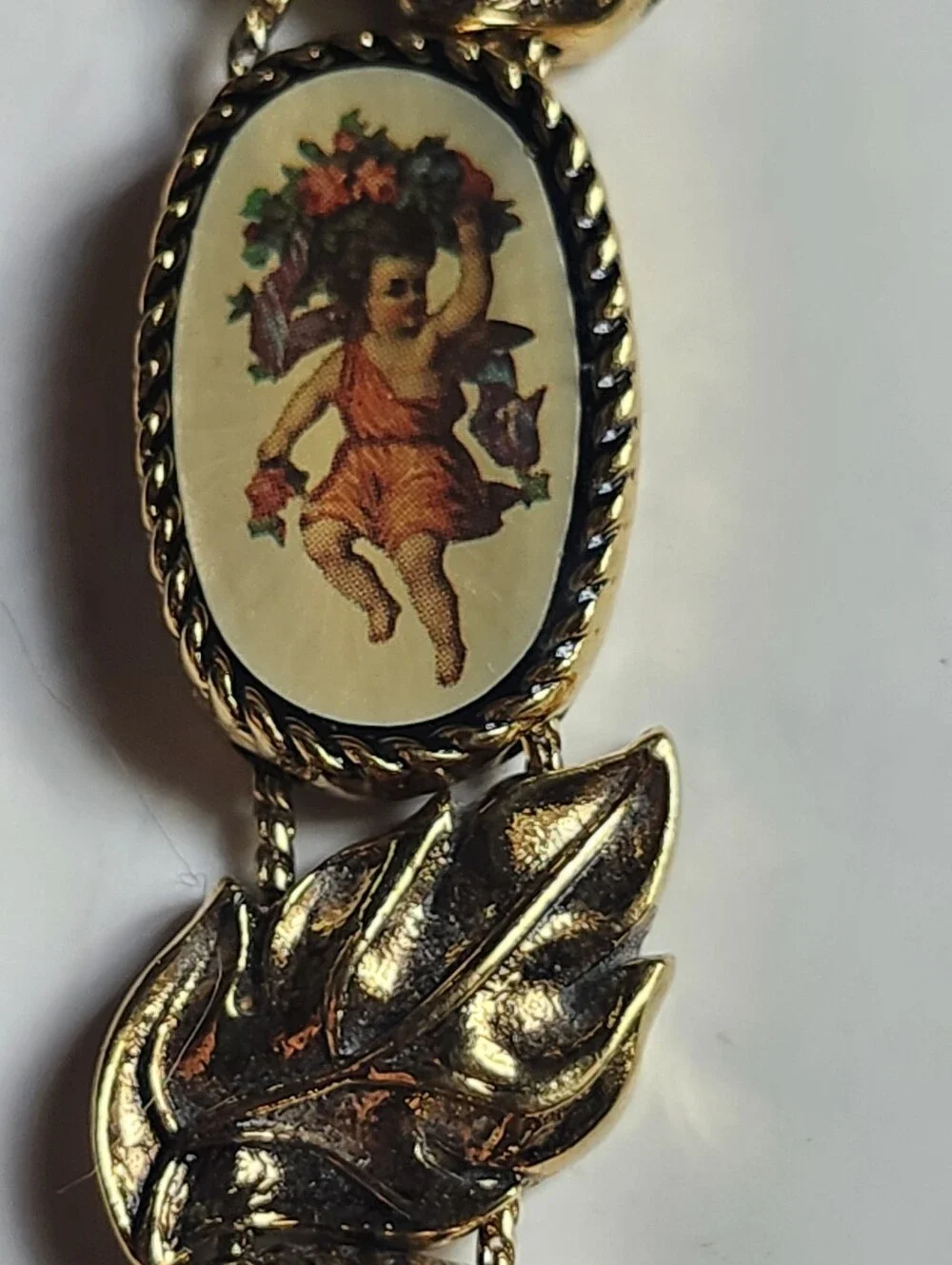 Vintage Gold Tone Floral Bracelet Watch with Cherub Medallions